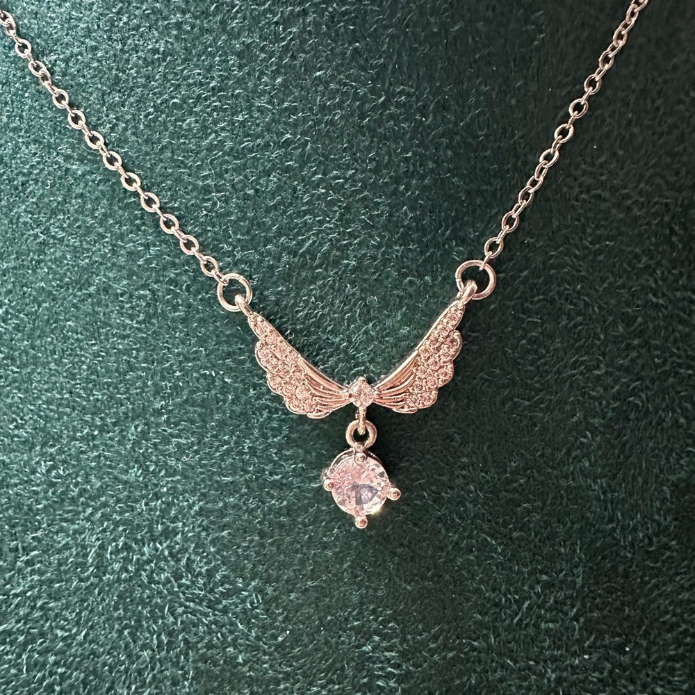 Elegant Silver Winged Pendant Necklace